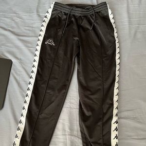 KAPPA small track pants with buttons along the sides in the colour black